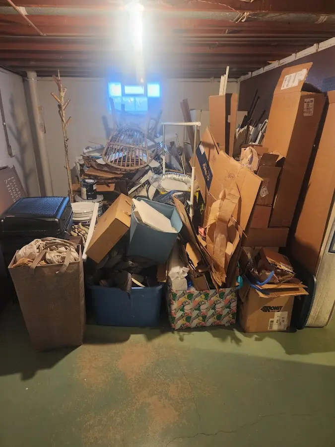 Roll-off dumpster container at job site for Roll Off Dumpster Rental in Naples